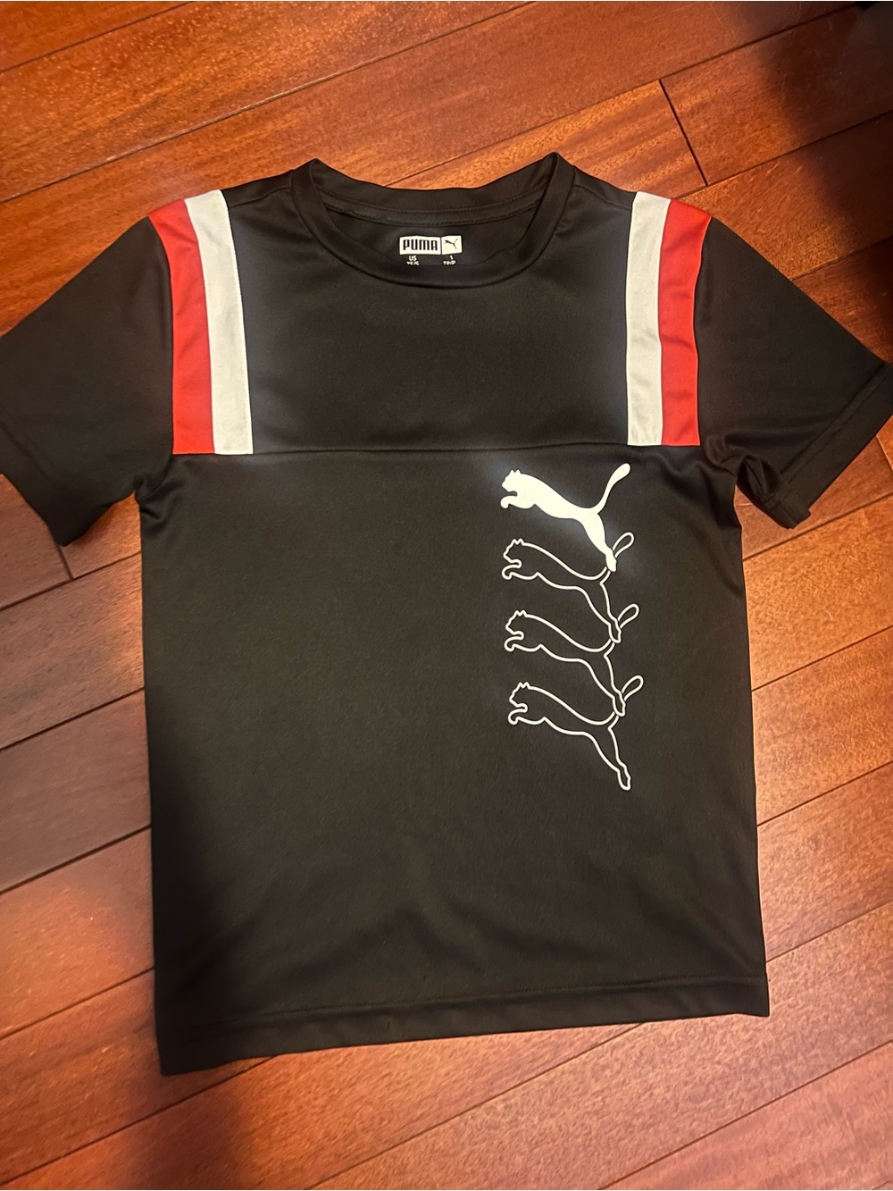 Puma kids Black Short-Sleeve Tee with Red and White Shoulder Stripes